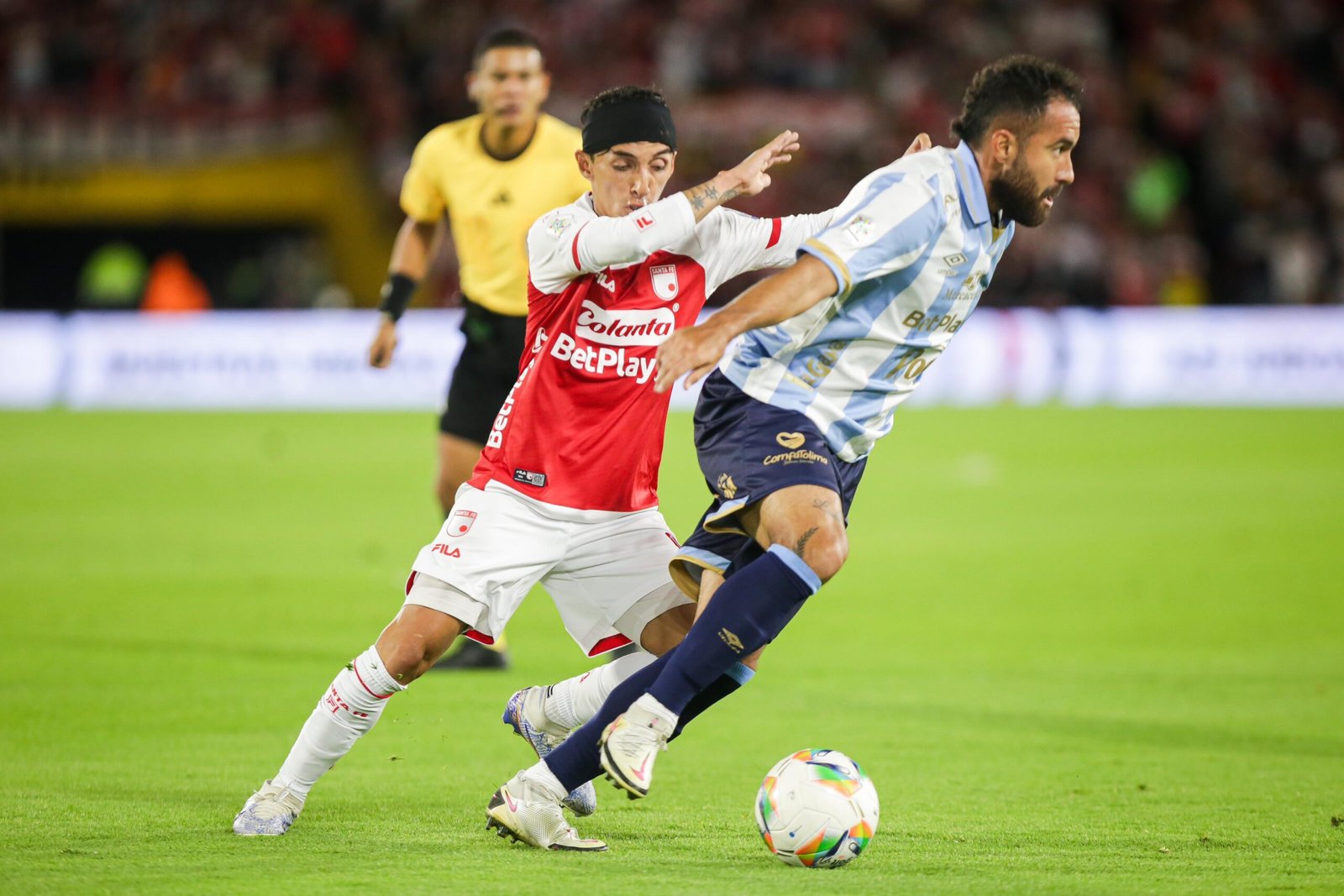 Santa Fe Sin lentamente con las estrellas; Tolim sacó una figura